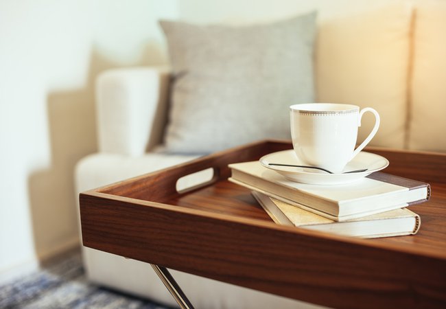 Pillow Sofa Home Interior Coffee cup Books on wooden table